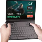 GPD-WIN-MAX-2-2024-LISTING-NEW-DONE-01.32-2 The GPD Win Max 2 (2024) is shown running The Witcher game on its display. The device features impressive specifications, including up to 64GB of RAM, up to 4TB SSD NVMe storage, and a Ryzen 7 8840U CPU, highlighting its capability to handle demanding games with ease.