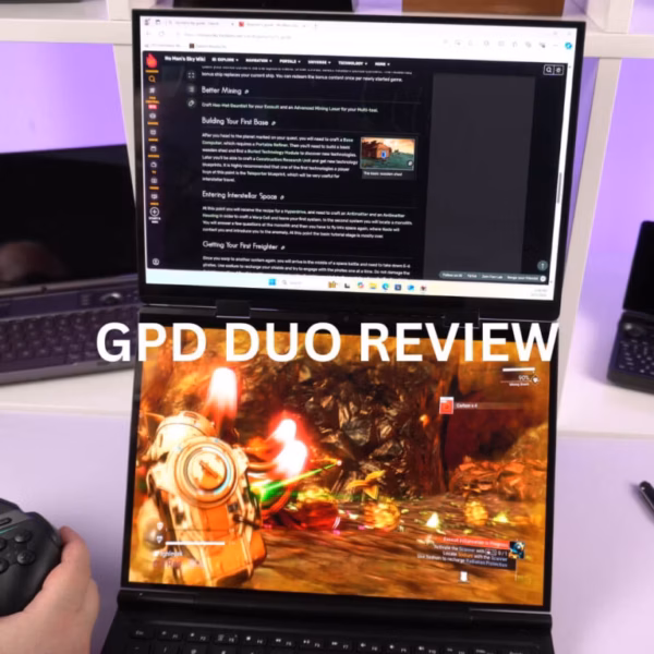 A thumbnail image for a video review of the GPD DUO dual-screen laptop. The device is open and held in a person's hands. The top screen displays a webpage with text-based instructions and guides, while the bottom screen displays an immersive third-person video game scene with a character in an orange and brown environment. The large white text "GPD DUO REVIEW" is overlaid across the central hinge area of the screens. The background is a brightly lit desk setup with shelves and neon accents.