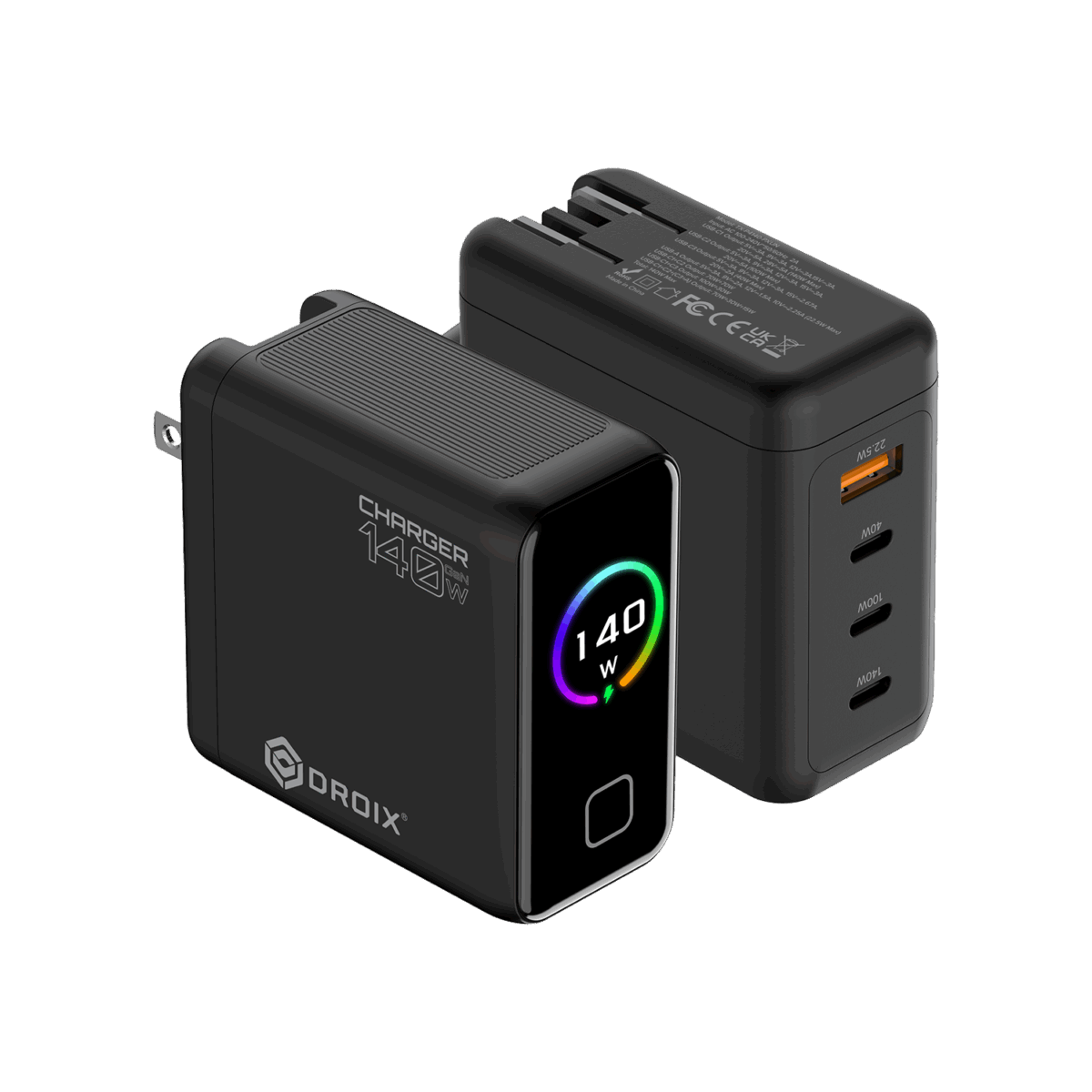 A detailed product render of two DROIX 140W GaN Wall Chargers from different perspectives, displayed on a black background. The foreground charger is in a front-three-quarter view. It is a matte black block with its US foldable plug partially extended on the left side. On its side, prominent white text reads "CHARGER 140W" with a large "O" and a small "140" above the "O," and the DROIX logo below it. The front glossy black face features a central circular display with a dynamic rainbow-colored ring around the white text "140 W" and a small green charging icon. Below the display is a button or LED indicator. The background charger is in a rear-three-quarter view, showing the ports and text details. It lists extensive multi-line technical specifications and safety certifications in small white text (such as model numbers, voltage/current ratings, and CE, FCC, UKCA marks). This unit displays its four output ports: from top to bottom, one orange-accented USB-A port labeled with small text "22.5W Max," followed by three USB-C ports labeled in order "40W", "100W", and "140W". Both units show top ventilation grills. This composition provides a comprehensive view of the charger's branding, display, and port capabilities.